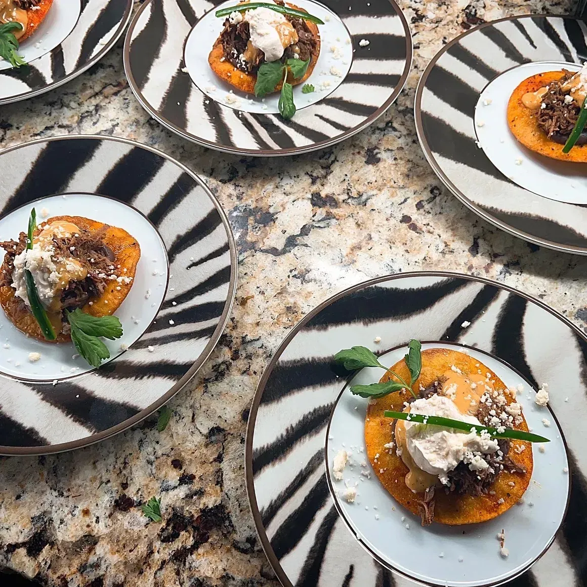 Black and white plated fine-dining dish